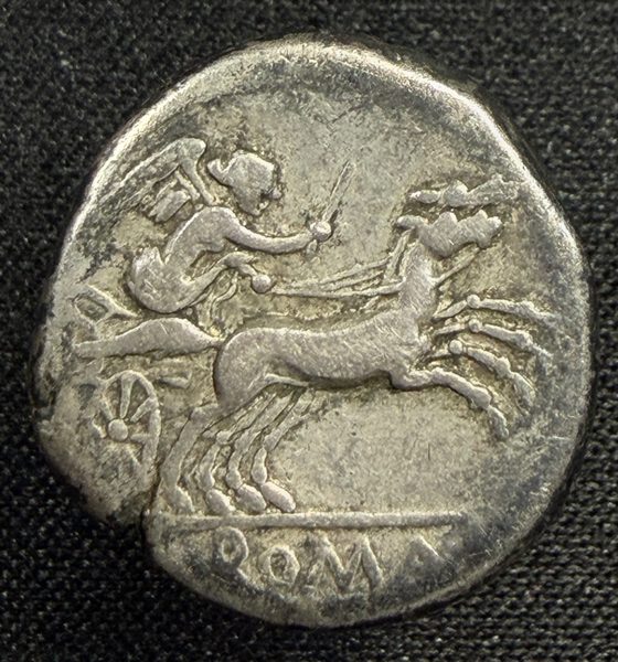 Reverse: Victory driving a galloping biga right, ROMA in the exergue.