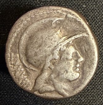 Denarius of P. Satrienus, head of Roma right.