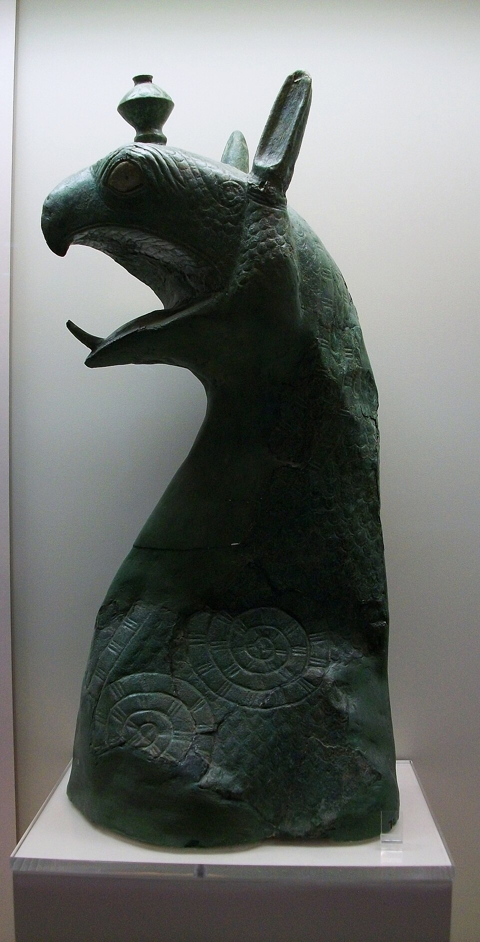 Bronze griffin protome from Olympia